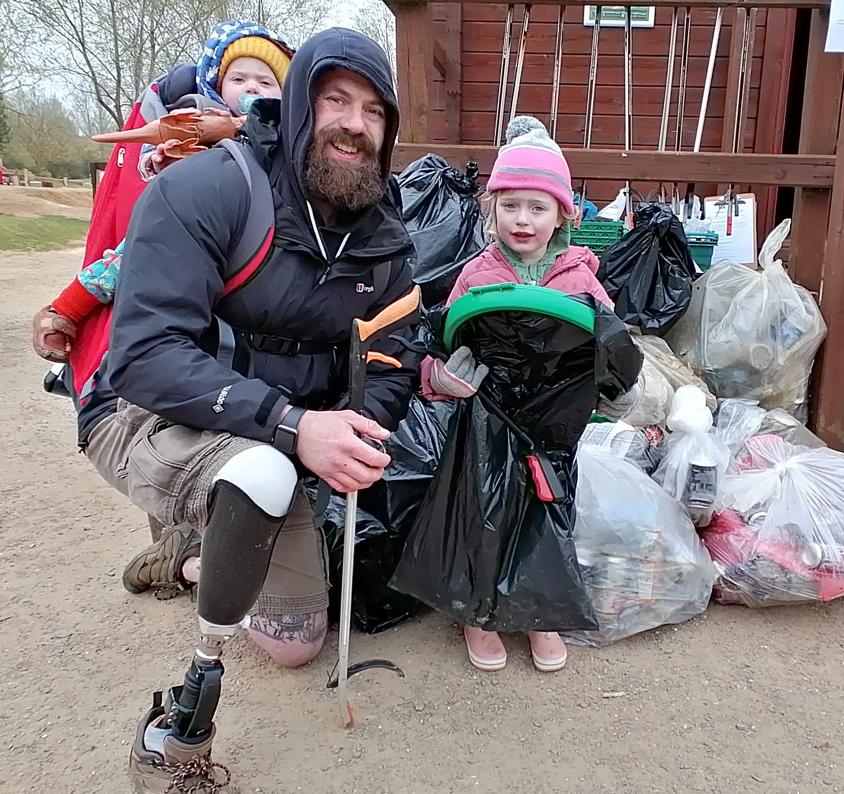 Dad and daughtesr Stanwick Lakes litter pick